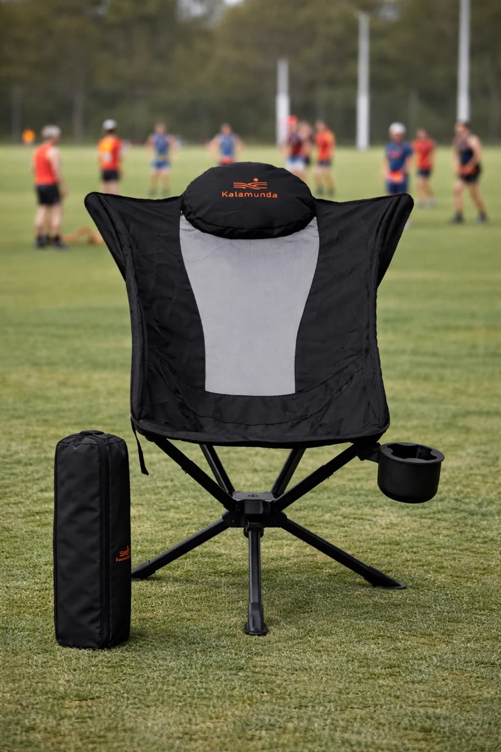 Two 360 High Back Chairs with carry pouches at a sports field